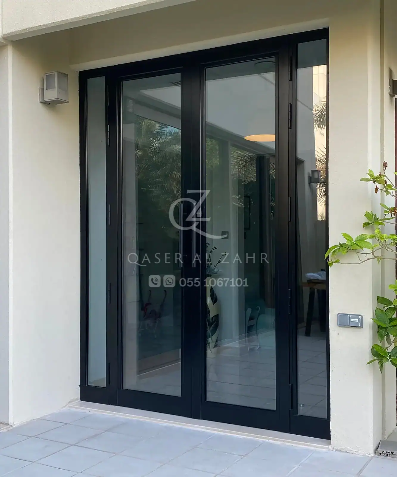 Privacy Wall Installation with Glass Panel Setup.